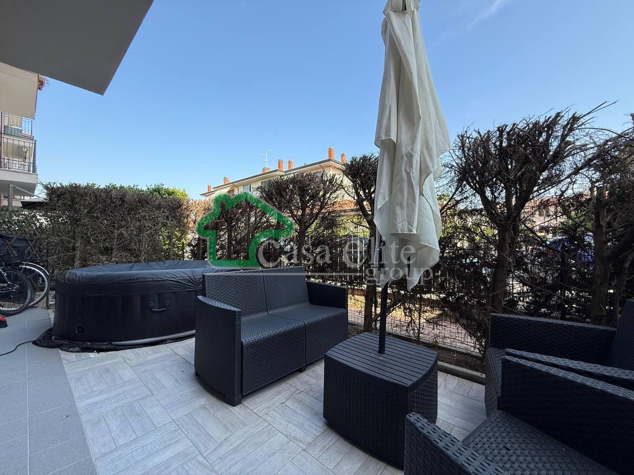 Trilocale ristrutturato con giardino privato e comfort